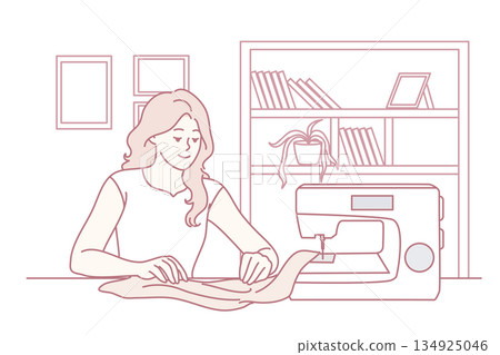 Happy woman sewing on machine at home Happy woman sewing on machine at home 134925046