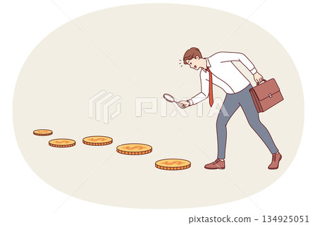 Business man looking for investment opportunities, following trail of gold coins 134925051