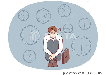 Business man sad because of lack time and problems with missing deadlines causing troubles at work Business man sad because of lack time and problems with missing deadlines causing troubles at work 134925059