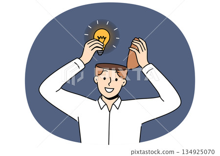 Man genius with new idea takes light bulb out of head after brainstorming to achieve success 134925070