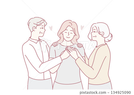 Happy elderly parents hugging grownup daughter 134925090