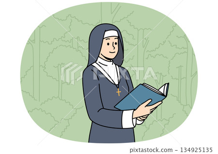 Woman nun with holy book stands in park, dressed in cassock for religious service in temple Woman nun with holy book stands in park, dressed in cassock for religious service in temple 134925135