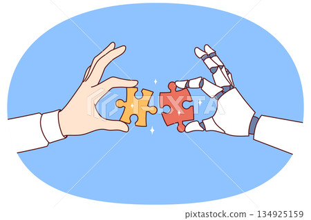 Collaboration between robot and human performing same task and holding pieces of puzzle in hands 134925159