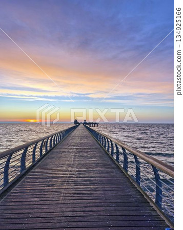 Symmetry on Groemitz pier at dusk 134925166