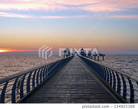 Symmetry on Groemitz pier at dusk 134925168