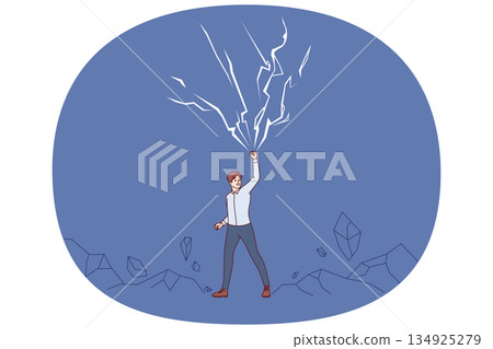 Powerful business man raises hand up near lightning bolts, demonstrating self-confidence 134925279