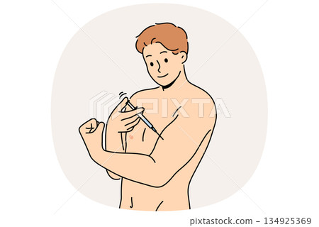Man bodybuilder uses doping to quickly achieve results in sports, gives injection in biceps 134925369