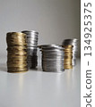Silver and cooper coins stacks on white background 134925375