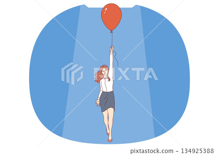 Woman achieves success in business and flies up in balloon thanks to professional actions 134925388