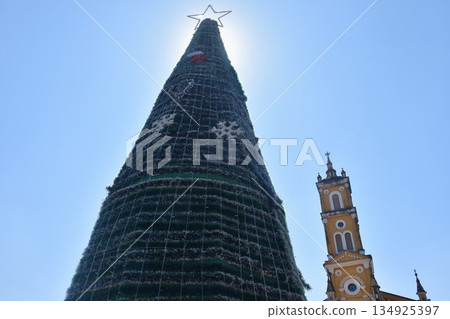 Christmas tree with star on top at Saint Joseph Catholic Church Ayutthaya on sunny day in Thailand 134925397