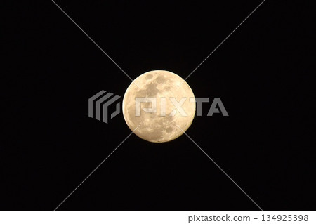 bright full moon floating on sky in night background bright full moon floating on sky in night background 134925398