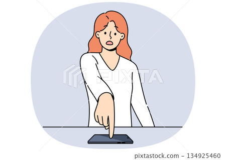 Indignant woman points finger at mobile phone after learning about leak of confidential information 134925460