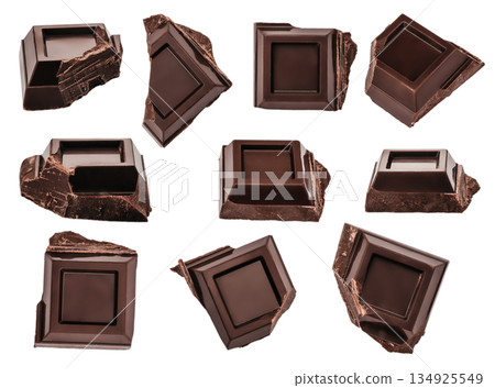 Assorted dark chocolate pieces in different angles isolated on white background 134925549