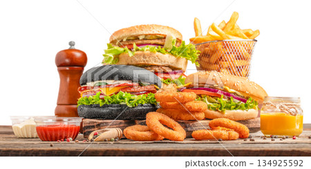 Fast food set with burgers, french fries, onion rings and sauces isolated on white background 134925592