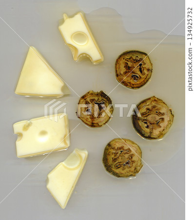 cheese and black nuts 134925732