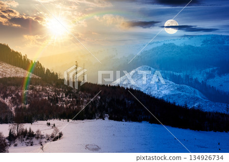 winter solstice landscape with snow covered forested hills. day and night time change concept. mountains in cold weather under sky with sun and moon. christmas holidays harmony and progress calendar 134926734