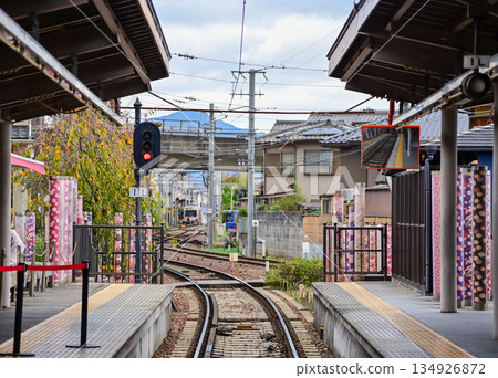 The train station in Arashiyamn, Kyoto, Japan with cloudy sky, Japan Transportation system. Travel concept. The train station in Arashiyamn, Kyoto, Japan with cloudy sky, Japan Transportation system. Travel concept. 134926872