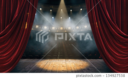 Curtains opened at a theater revealing the stage and lights for an upcoming performance in the evening 134927538