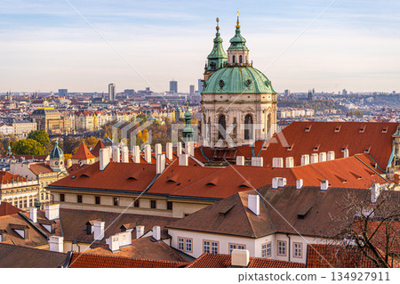 Autumn in Praha. Red orange old tile roofs architecture in Prague Czech Republic Old house building top view 134927911