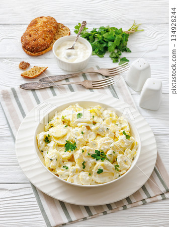 german potato salad in a bowl, close-up 134928244