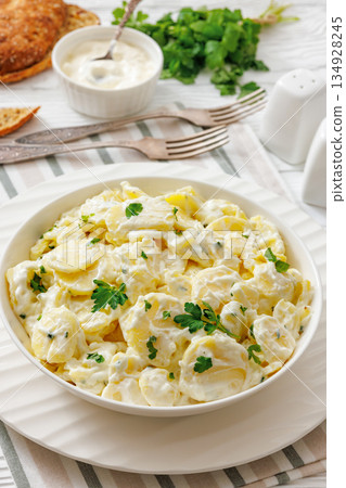 german potato salad in a bowl, close-up 134928245