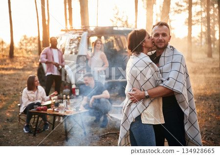 Conception of love, couple embracing each other. Group of friends are together in the forest 134928665
