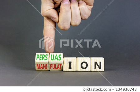 Persuasion or manipulation symbol. Concept words Persuasion and Manipulation on wooden cubes. Beautiful grey background. Psychologist hand. Psychology persuasion manipulation concept. Copy space. Persuasion or manipulation symbol. Concept words Persuasion and Manipulation on wooden cubes. Beautiful grey background. Psychologist hand. Psychology persuasion manipulation concept. Copy space. 134930748