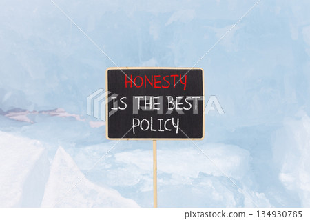 Honesty is the best policy symbol. Concept words Honesty is the best policy on beautiful blackboard. Beautiful blue Baikal ice background. Business honesty is the best policy concept. Copy space. Honesty is the best policy symbol. Concept words Honesty is the best policy on beautiful blackboard. Beautiful blue Baikal ice background. Business honesty is the best policy concept. Copy space. 134930785
