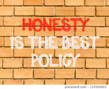Honesty is the best policy symbol. Concept words Honesty is the best policy on beautiful brown brick wall. Beautiful brick wall background. Business honesty is best policy concept. Copy space. Honesty is the best policy symbol. Concept words Honesty is the best policy on beautiful brown brick wall. Beautiful brick wall background. Business honesty is best policy concept. Copy space. 134930803