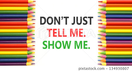 Tell or show symbol. Concept words Do not just tell me, show me on beautiful white paper. Beautiful white background. Colored pencils. Business tell or show concept. Copy space. 134930807