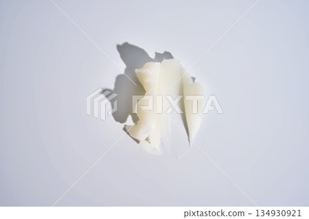 White cosmetic cream texture swatching on clean background 134930921