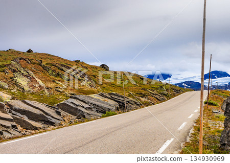 Asphalt road in mountains 134930969
