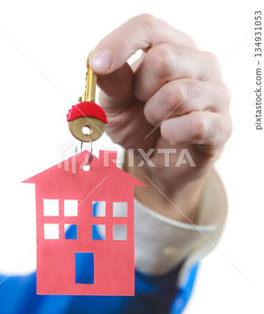 Man hand holding home keys 134931053
