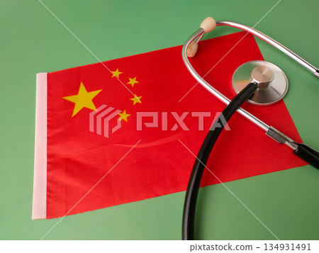The image is a conceptual representation of healthcare in China, combining the national flag with a stethoscope. The image is a conceptual representation of healthcare in China, combining the national flag with a stethoscope. 134931491