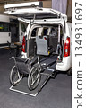 Innovative wheelchair-accessible van with a sleek ramp for smooth mobility. 134931697
