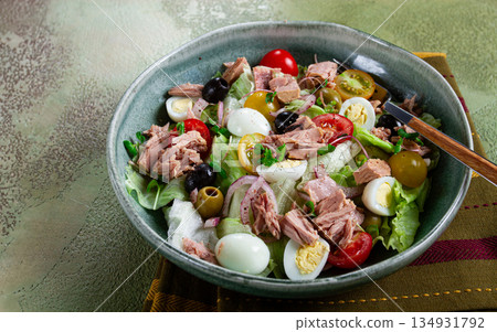 salad with canned tuna, vegetable salad with quail eggs, lettuce, red onion , cherry tomatoes , olives, keto food, healthy food, homemade, no people salad with canned tuna, vegetable salad with quail eggs, lettuce, red onion , cherry tomatoes , olives, keto food, healthy food, homemade, no people 134931792