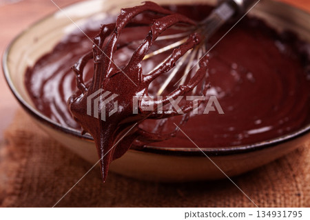 a bowl of chocolate dough, a whisk for whipping, baking, structure and consistency, homemade, top view, no people, a bowl of chocolate dough, a whisk for whipping, baking, structure and consistency, homemade, top view, no people, 134931795