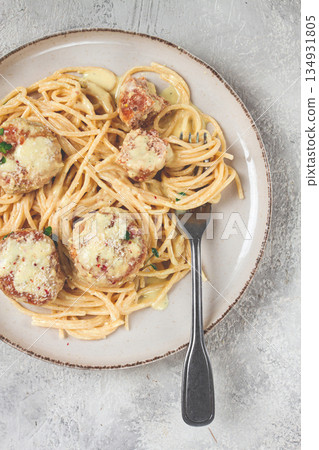 spaghetti with chicken meatballs, with cream sauce, and parmesan cheese, and decorated with microgreens, homemade, no people, 134931805