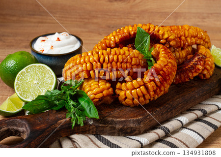 corn ribs, with cream sauce , spices and lime, appetizer, homemade, no people, 134931808