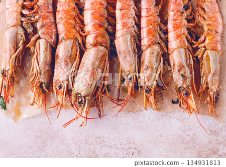 shrimps on skewers, Grilled, spread on a marble surface, garnished, with lemon slices, and fresh herbs, view from above, shrimps on skewers, Grilled, spread on a marble surface, garnished, with lemon slices, and fresh herbs, view from above, 134931813