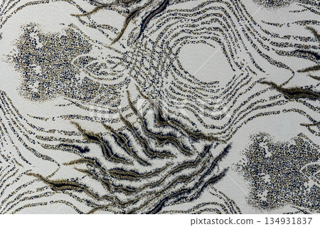 Light gray-beige jacquard fabric texture with metallic lurex and dark graphite abstract pattern, textile collection Light gray-beige jacquard fabric texture with metallic lurex and dark graphite abstract pattern, textile collection 134931837