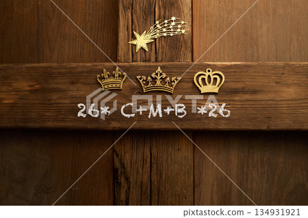 Epiphany door blessing with chalk and golden crowns Epiphany door blessing with chalk and golden crowns 134931921
