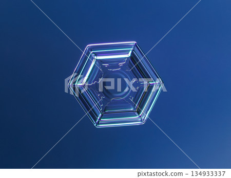 Natural snowflake crystal in blue background Natural snowflake crystal in blue background 134933337