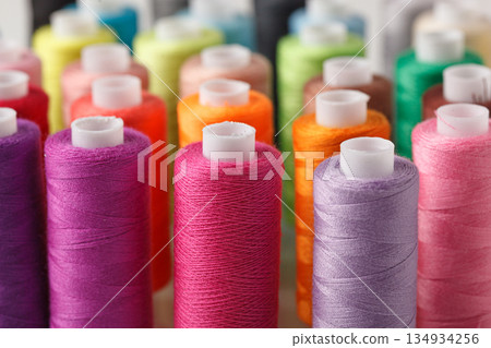 Set of colorful spools of thread 134934256