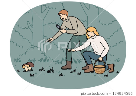 Man and woman are searching for mushrooms in forest using wicker basket and magnifying glass Man and woman are searching for mushrooms in forest using wicker basket and magnifying glass 134934595