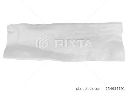 A single facial tissue on a white background 134935191