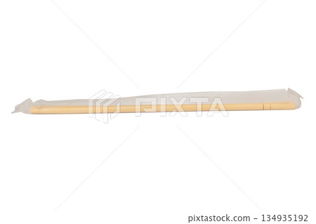 Unused wooden chopsticks in a plastic bag on a white background Unused wooden chopsticks in a plastic bag on a white background 134935192