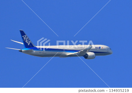 ANA plane ascending ANA plane flying in the blue sky 134935219