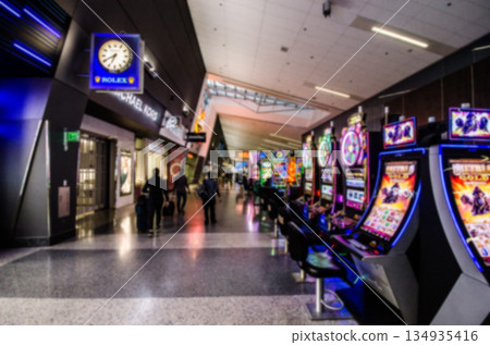 Blurred image of the casino at Harry Reid International Airport in Las Vegas 134935416