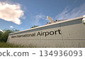 Departures at Miami International Airport with airplane leaving overhead, Miami, United States 3D rendering 134936093